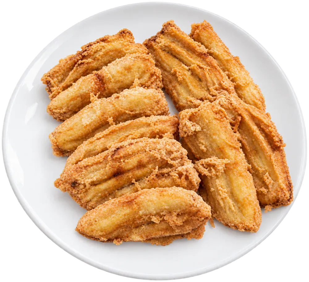 Setumpuk pisang goreng berbalut adonan goreng keemasan